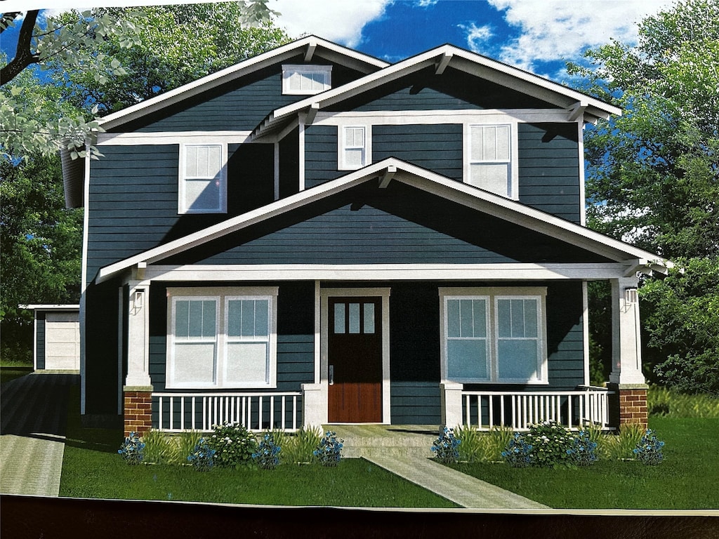 craftsman-style house with a front yard and a porch