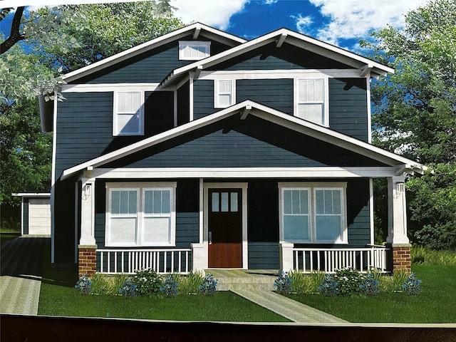 craftsman-style house with a front yard and a porch