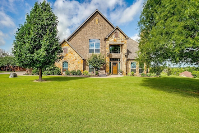 view of front of home with a front yard