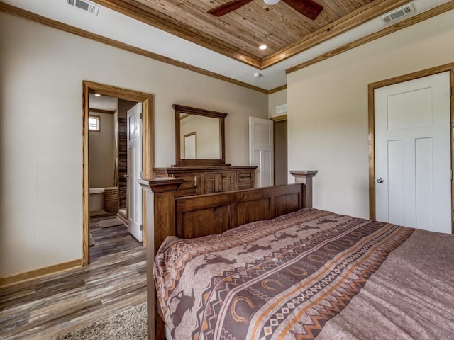 bedroom featuring wood ceiling, a raised ceiling, ceiling fan, crown molding, and dark hardwood / wood-style floors