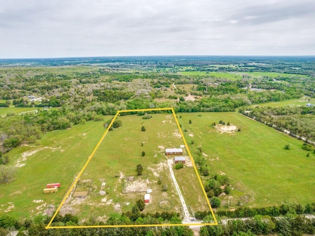 birds eye view of property featuring a rural view