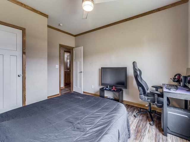 bedroom featuring dark hardwood / wood-style flooring and ornamental molding