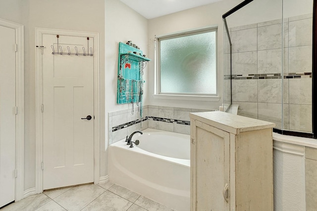 bathroom with tile patterned floors and plus walk in shower