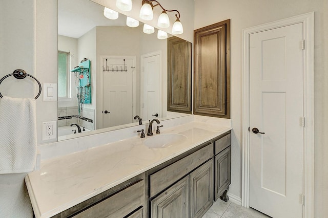 bathroom with tile patterned flooring and vanity