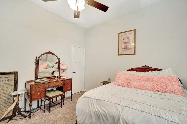 bedroom with ceiling fan and light colored carpet