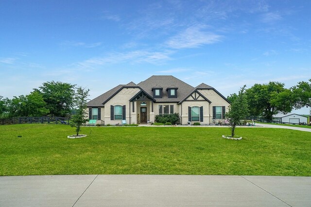 view of front of home with a front yard