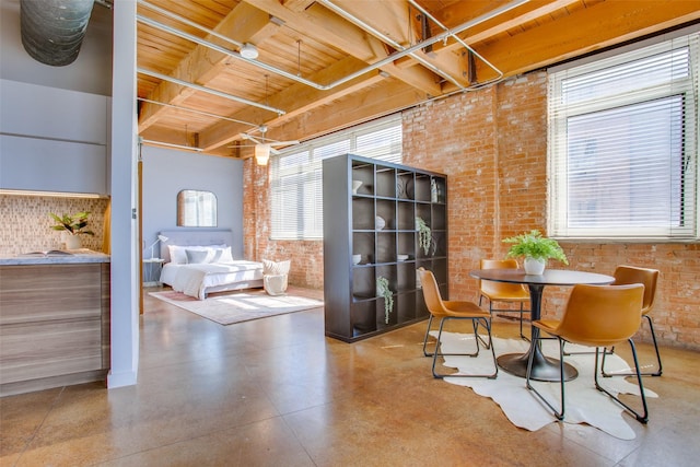 dining room with brick wall, beam ceiling, and wood ceiling