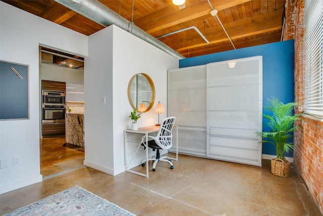 office space with wood ceiling and beam ceiling