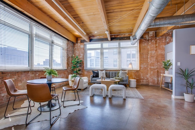 sunroom featuring beamed ceiling and wood ceiling