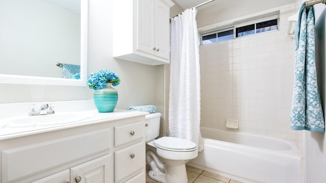 full bathroom with tile patterned flooring, shower / tub combo, vanity, and toilet