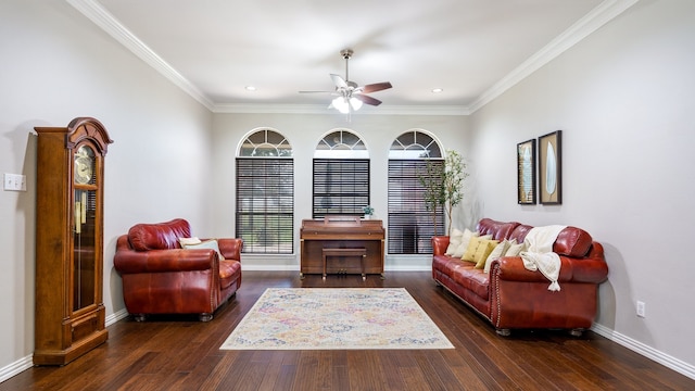 living room with ceiling fan, dark hardwood / wood-style floors, and crown molding