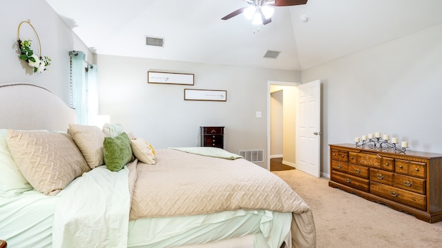 carpeted bedroom with ceiling fan and lofted ceiling