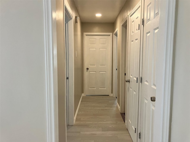 hall featuring light hardwood / wood-style floors