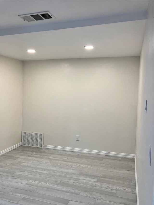 unfurnished room featuring light wood-type flooring