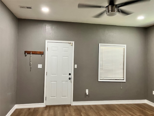 entryway with hardwood / wood-style floors and ceiling fan