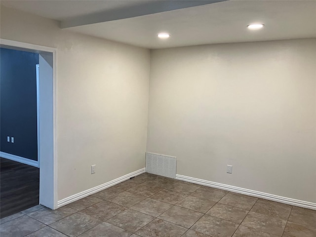 view of tiled spare room