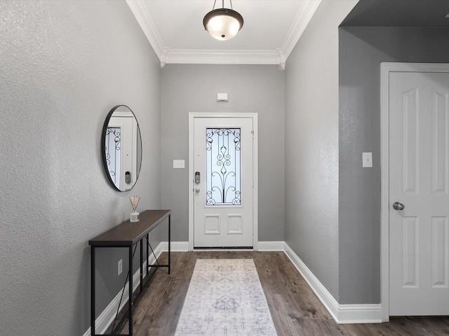 foyer featuring crown molding and dark hardwood / wood-style floors