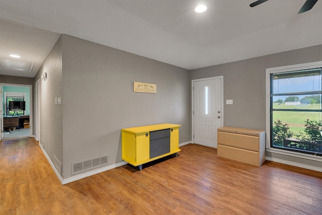 entryway with ceiling fan and light wood-type flooring