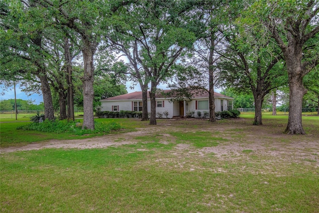 exterior space featuring a front yard