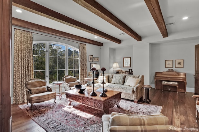 living room with beamed ceiling and wood-type flooring