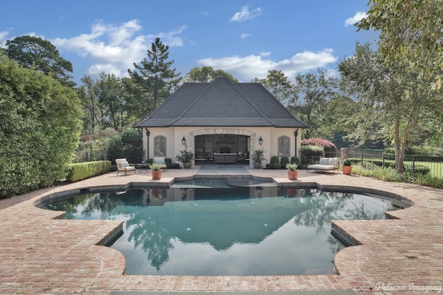 view of swimming pool featuring a patio