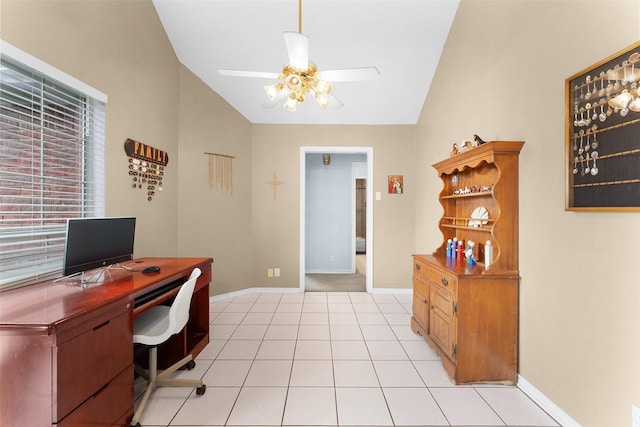 office space featuring ceiling fan, light tile patterned floors, and vaulted ceiling