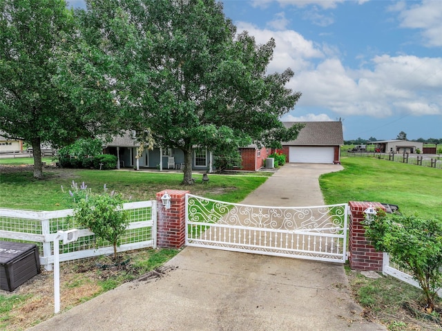 view of front facade with a front yard and a garage