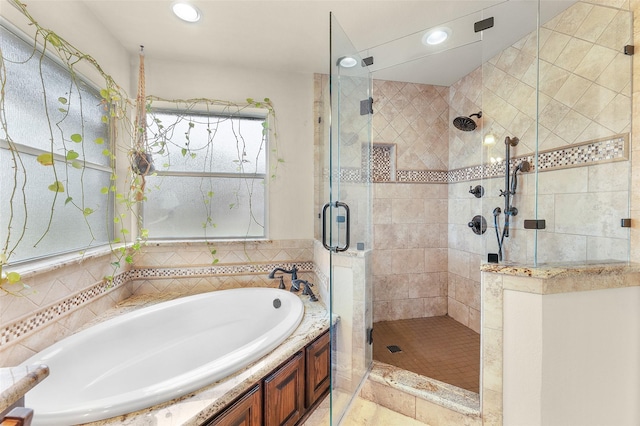 bathroom featuring plus walk in shower