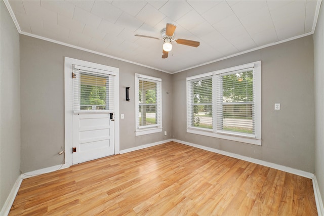 unfurnished room featuring ceiling fan, ornamental molding, and light hardwood / wood-style floors