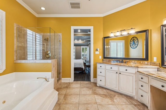 bathroom featuring tile patterned flooring, shower with separate bathtub, crown molding, and vanity