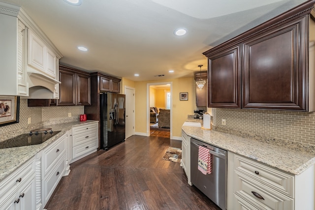 kitchen with backsplash, dark wood-type flooring, white cabinetry, and black appliances