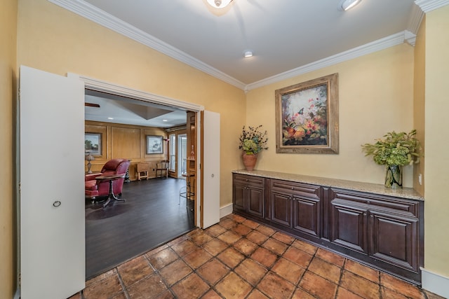 hall featuring dark hardwood / wood-style flooring and ornamental molding