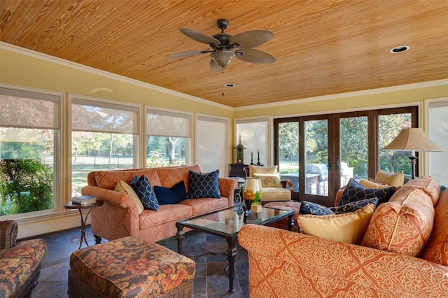 living room with french doors, crown molding, and wood ceiling