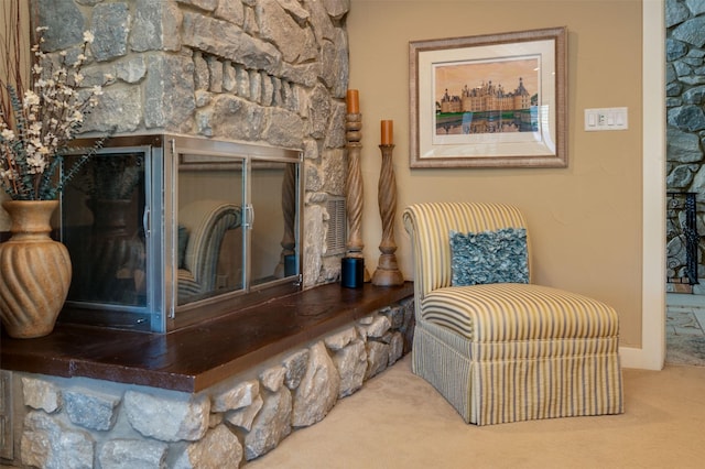 sitting room with carpet flooring