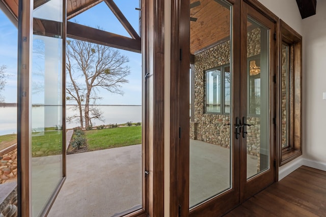 doorway to outside featuring dark hardwood / wood-style floors and french doors