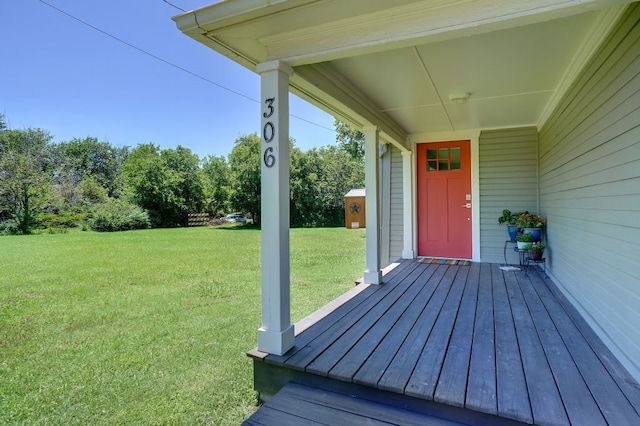 deck featuring a lawn