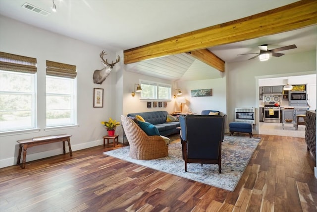 living room featuring vaulted ceiling with beams, hardwood / wood-style floors, and ceiling fan