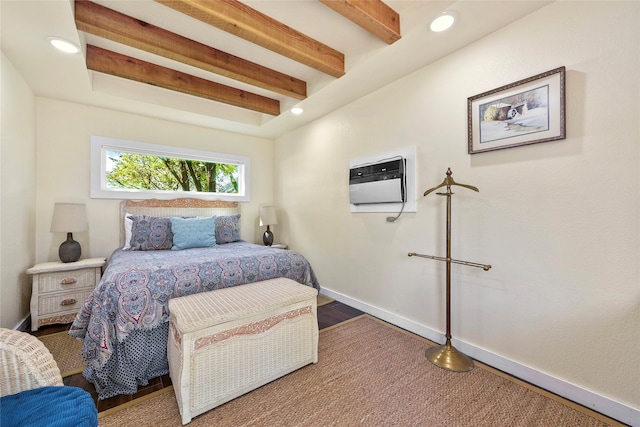 bedroom with beam ceiling and a wall mounted air conditioner