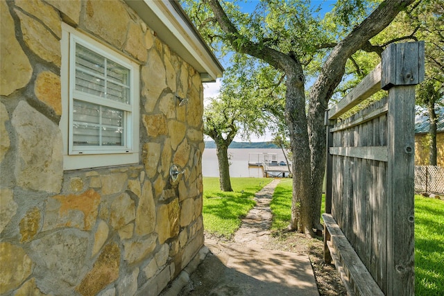 view of property exterior featuring stone siding