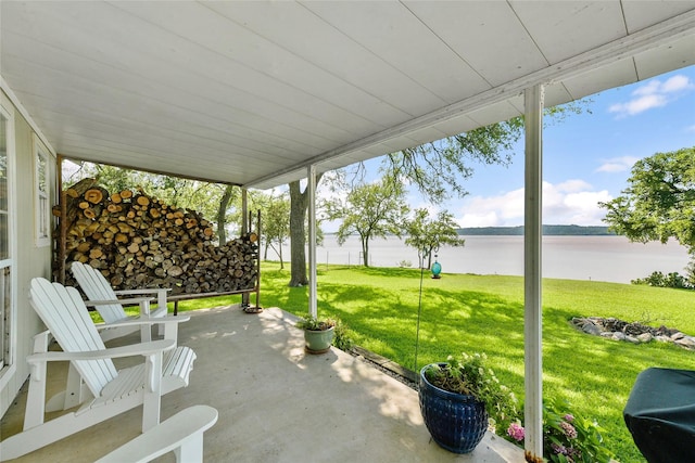 view of patio / terrace featuring a water view