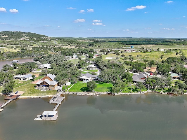 aerial view featuring a water view and a residential view