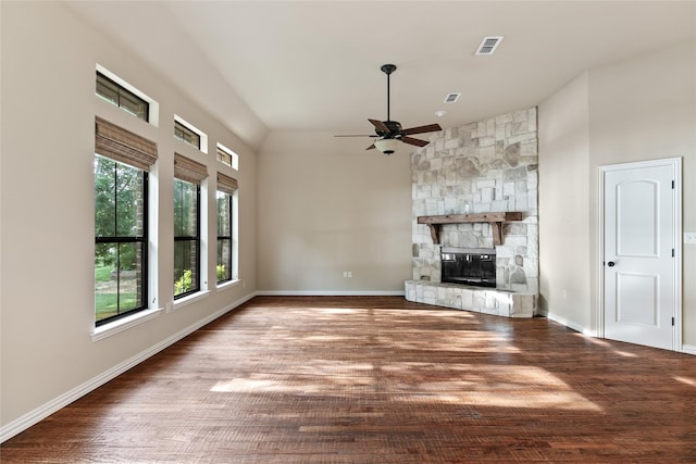 unfurnished living room featuring a fireplace, ceiling fan, and dark hardwood / wood-style floors