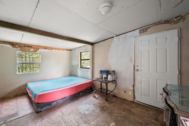 bedroom with multiple windows