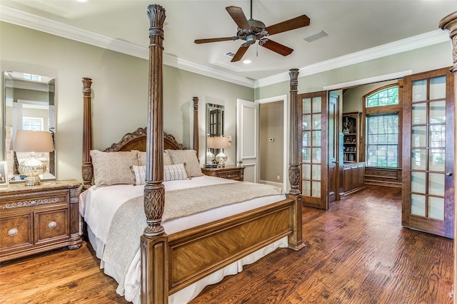 bedroom with ornamental molding, french doors, hardwood / wood-style flooring, and ceiling fan