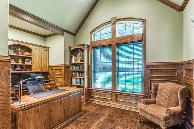 home office with a healthy amount of sunlight, vaulted ceiling, dark hardwood / wood-style floors, and ornamental molding