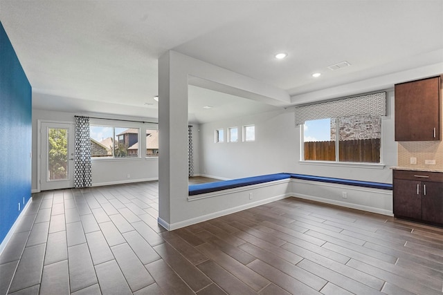 empty room featuring dark hardwood / wood-style floors