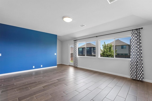 empty room with wood-type flooring