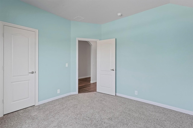 unfurnished bedroom featuring carpet