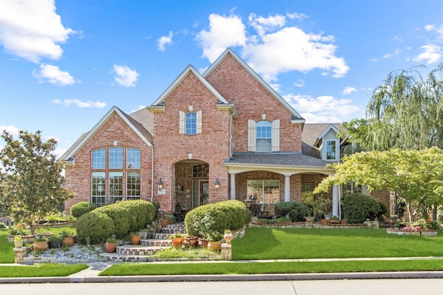 view of front of home with a front yard