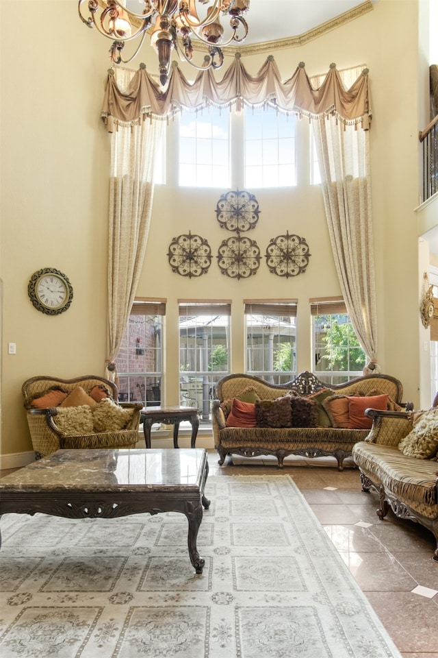 living area featuring a towering ceiling and a notable chandelier